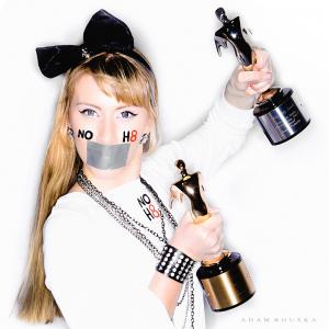 Tara-Nicole Azarian with 2 of her Telly Awards, supporting the NOH8 event.