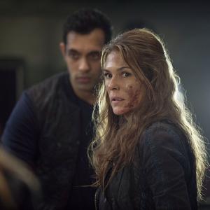 Still of Paige Turco and Sachin Sahel in The 100 (2014)
