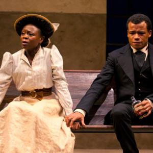 Prudence Zainab Jah receives comfort from Chilford LeRoy McClain in the world premiere production of The Convert by Danai Gurira directed by Emily Mann