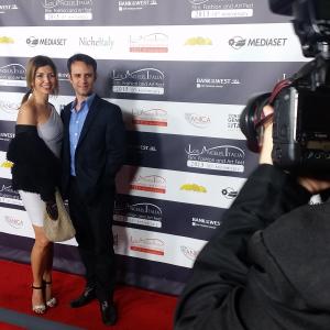 Maximilian Law and Romina Caruana at a Los Angeles red carpet premiere