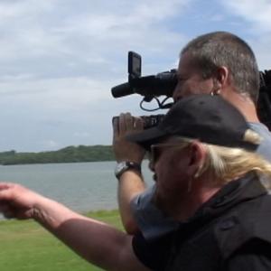 Doug Jefferson the DP and Editor of CMTs Road Pranks helps Donnie Van Zant of 38 Special pull a brink on his crew