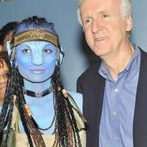 Elle Viane Sonnet and Director James Cameron at the opening night of the Avatar Exhibit at the SciFi Museum in Seattle WA