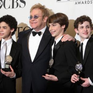 David Alvarez, Sir Elton John, Kiril Kulish, and Trent Kowalik after receiving the Tony for best actor in a musical.
