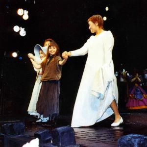 Adrianna Bertola as Young Cosette in Les Miserables at The Queens Theatre London West End