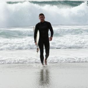 On the set of The Forger Scott Reeves Clint Eastwoods son surfing on his day off This is also the same photo Scott uses for his IMDB primary photo I am the photographer of this photo Go to wwwreelrescuecom to view Kris entire portfolio