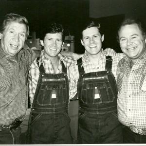 Buck Owens, Butch McCain, Ben McCain and Roy Clark on the set of Hee Haw in Nashville. The McCain Brothers saluted their hometown, Bovina, Texas.