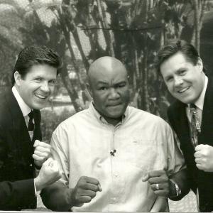 Butch McCain, former Heavyweight Champion George Foreman and Ben McCain posing after interview.