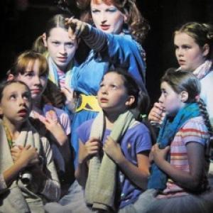 (pink striped shirt lower right) As Julie Hope in Billy Elliot on Broadway