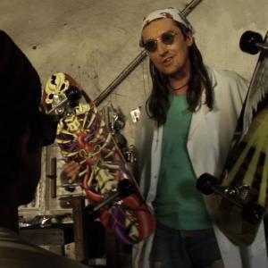 CircusSzalewski as surfskate inventor M in ROAD TO RED
