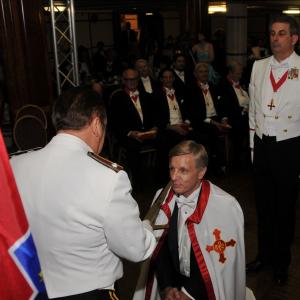 Sir Kim Richards being Knighted
