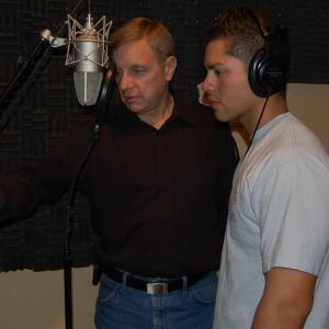 Kim Richards with Nick Cardenas oldest son of Renegade drummer and vocalist Luis Cardenas Young Nick was in the studio contributing both vocal and drum skills for his fathers upcoming solo offering Richards who is producing is seen here giving Nick some guidance during a recent recording session