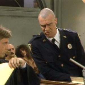 Still of Harry Anderson and Richard Moll in Night Court (1984)