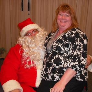 Someone thought Id make a good Santa Of course thats Mrs Claus on Santas lap