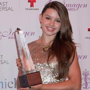 Actress Ftima Ptacek at 2014 Imagen Awards with Best Actress Award