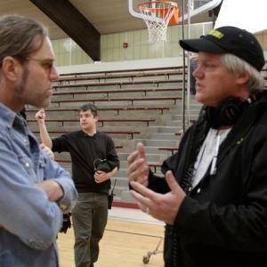 Conferring with musician/actor Big Kenny the set of The Frontier Boys with