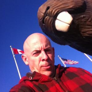 With the giant beaver of Beaverlodge, Alberta, while driving the Alaska Highway in WINTER, Feb. 2012. Glenn has traveled the highway about 7 times.