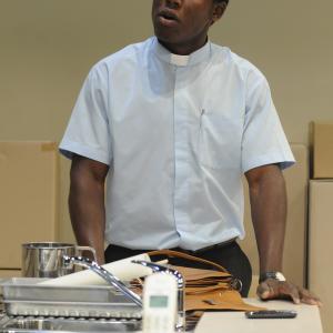 Pacharo Mzembe as Father Ezikiel Gwen in Purgatory