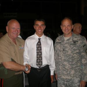 Christopher with General Wolff Commander of the Navy Militia and Major General Steve Wickstrom of US Army recognition of Christophers song he wrote for our Veterans