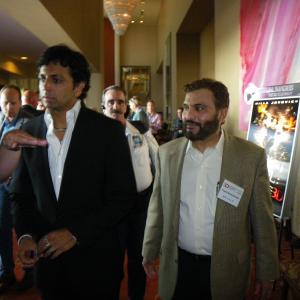 Yusuf Baruch with M. Night Shyamalan at 3D Film Summit