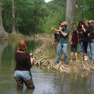 crew filming on the Blanco River. The director, Rodger Marion, is in the green shirt.