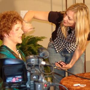 Christoffs Gilded Lily touches up Carla Daws makeup for the wine bar scene in Wine Bar of the Mind