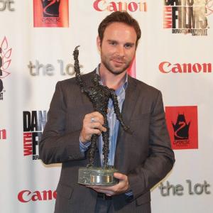 Actor Bryan Kaplan holds Grand Jury Award for the film Fray