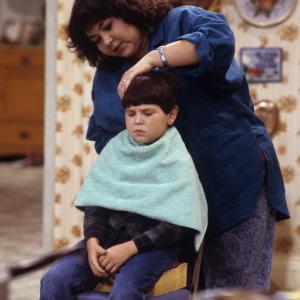 Still of Roseanne Barr and Michael Fishman in Roseanne 1988