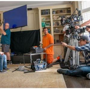 Chris Columbus directs Matt Lintz and Adam Sandler on the set of Pixels