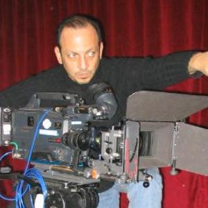 Film director, writer Gianfranco Serraino on the set of No More Terrorism, No More War. Italy, 2004.