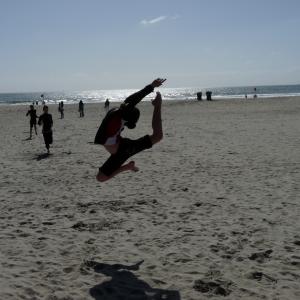 Danielle doing double stag on the beach.