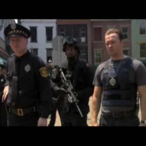 Portraying a police officer in a scene with Donnie Wahlberg, from Spike TV's 