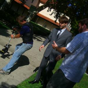 On the set of The Cypherian 2008 as DK along with actor Jacob Newton and DP J Sren Viuf rehearse for the next shot