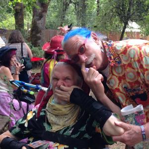 This is me David W Oaks with my bluehaired friend The Real Patch Adams MD as we discuss global revolution during the Oregon Country Fair Clear now?