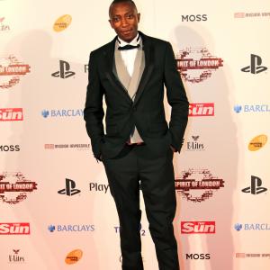 Emmanuel Akintunde on the red carpet at Spirit of London Awards London O2 2012