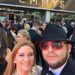 Producer Peggy Lane and writer Chris Molina arrive at the 2015 Emmys