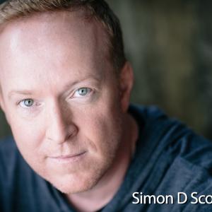 Simon D Scott
