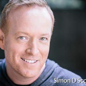 Simon D Scott