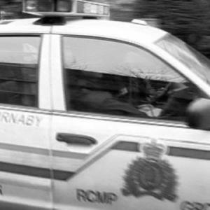 RCMP Constables Weissbock and Conlin blur past the camera into action