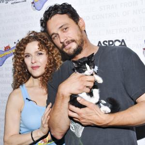 Bernadette Peters James Franco and kitten Totes Magotes attend Broadway Barks 16 at Shubert Alley on July 12 2014 in New York City