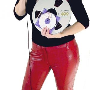 A posed blast from the past shot of me and my actual studio reel from my first album from the mid 90s