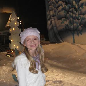 On the set of her first commercial for an ice skating doll