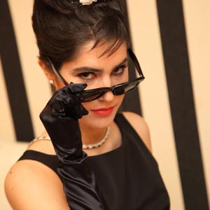 Natalia Lvarez as Holly Golightly