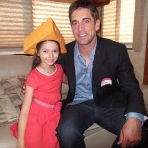 Nikki Hahn and Green Bay Packers Quarter Back Aaron Rodgers on set of STATE FARM 2012