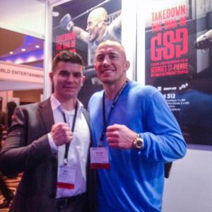 Stanislav Shkilnyi with George St Pierre at a film event NATPE