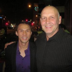 Thom Tran with Nick Searcy from FXs Justified at a Charity event in Los Angeles December 2011