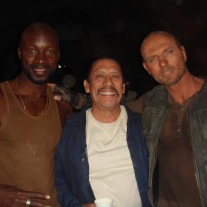 Eugene Khumbanyiwa as Nero with Danny Trejo and Luke Goss on Death Race Inferno set Cape Town South Africa