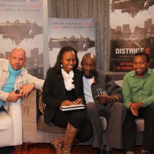 David James, Eugene Khumbanyiwa , Mandla Gaduka and media personality Elana Afrika(second left) during the District 9 media junket at Rosebank Hotel Crowne Plaza, Johannesburg. South Africa. 2009
