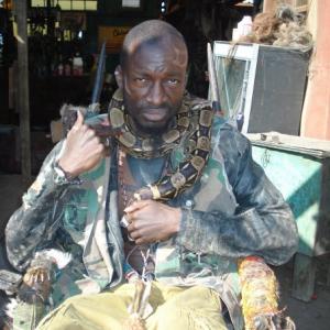 Eugene Khumbanyiwa as Obesandjo on set of the four time Oscar nominated District 9 (2008)