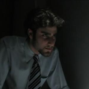The Specialist (Kyle Colton) interrogating a suspect in 