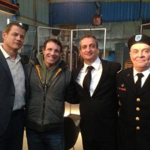 Robert Reynolds on the set of Hunted with from left to right Michael Par Mitch Gould Jo Marr and Robert Reynolds as General Callahan